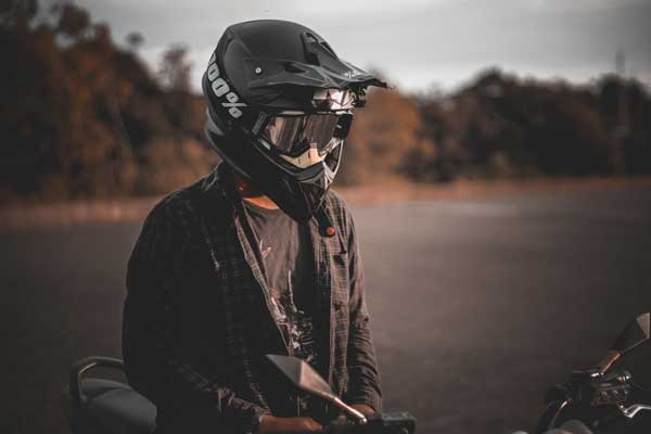 man wearing motorcycle helmet